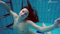 Tattooed babe Liza Bubarek showing her naked ass underwater